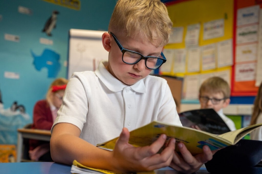 kid learning from sound waves spelling book